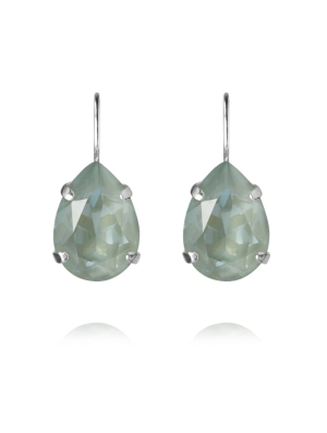 Caroline Svedbom Mini Drop Örhängen - Silver / Agave Ignite 100375139401, handla denna klocka online eller i butik hos klockmaster