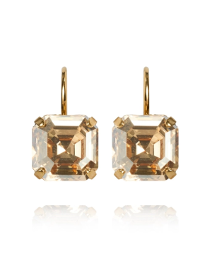 Caroline Svedbom Eve Örhängen - Guld / Golden Shadow 102133104001, handla denna klocka online eller i butik hos klockmaster