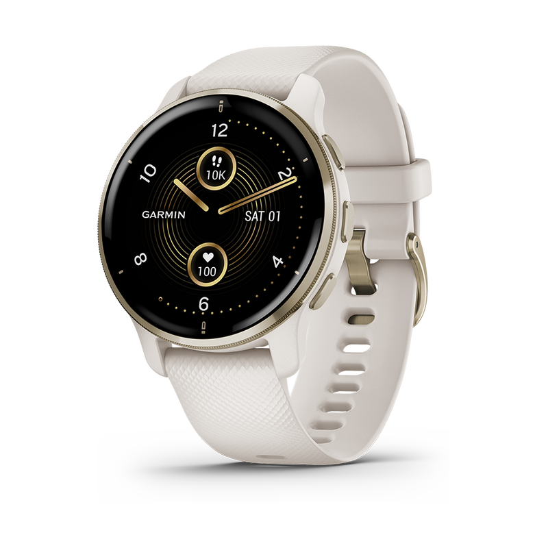 Garmin smartwatch i guld med vitt armband i silikon med guldigt spänne. Urtavla i svart med mätartal och visare i vitt och guld.
