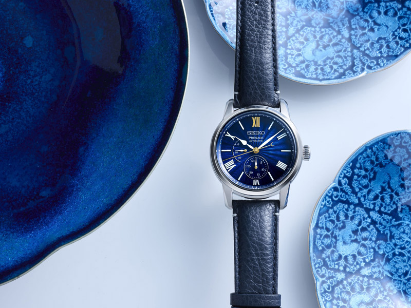 Seiko klocka med silver boett, blå urtavla och rem.
