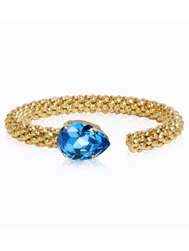 Caroline Svedbom Classic Rope Armband - Guld / ReCreated Ice Blue 100022137001, handla denna klocka online eller i butik hos klockmaster