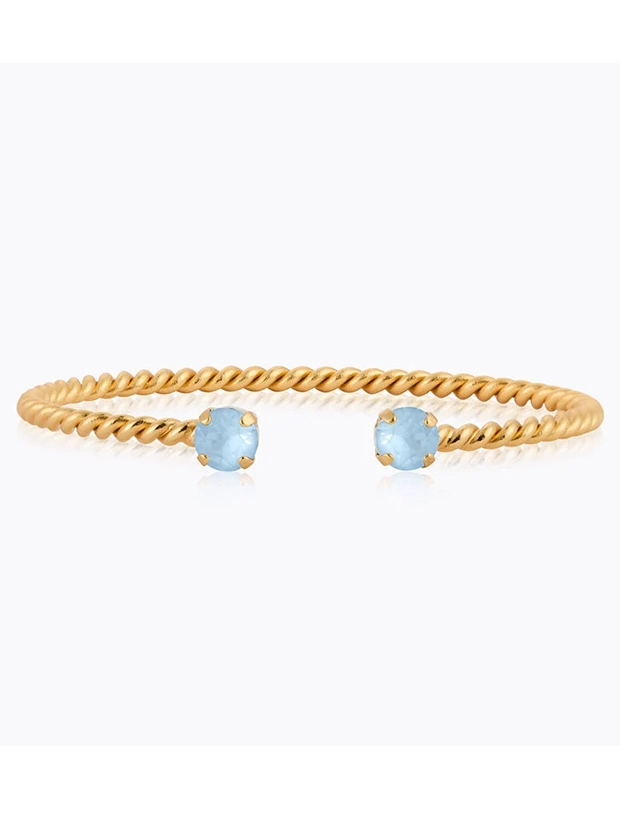 Caroline Svedbom Mini Twisted Armband - Guld / Sky Ignite 101348132001, handla denna klocka online eller i butik hos klockmaster