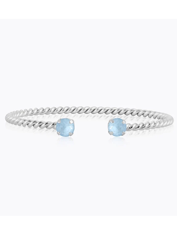 Caroline Svedbom Mini Twisted Armband - Silver / Sky Ignite 101349132001, handla denna klocka online eller i butik hos klockmaster