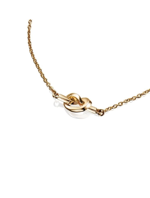 Efva Attling Armband Love Knot - Guld 14-108-00967-1519, klocka som du kan handla till bra pris hos oss på Klockmaster.