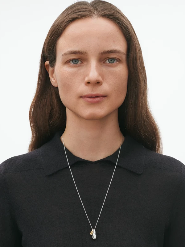 Georg Jensen Reflect Dubbelt Hänge - Silver/Guld 20001845, klocka som du kan handla till bra pris hos oss på Klockmaster.