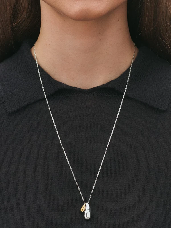 Georg Jensen Reflect Dubbelt Hänge - Silver/Guld 20001845, klocka som du kan handla till bra pris hos oss på Klockmaster.